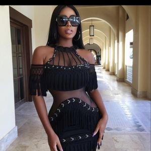 Fashion Nova Dress Mesh Black.  Statemen dress. New! Can fit small or medium!